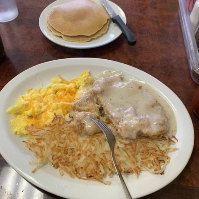 Chicken Fried Chicken & 2 Eggs with 2 Pancakes.