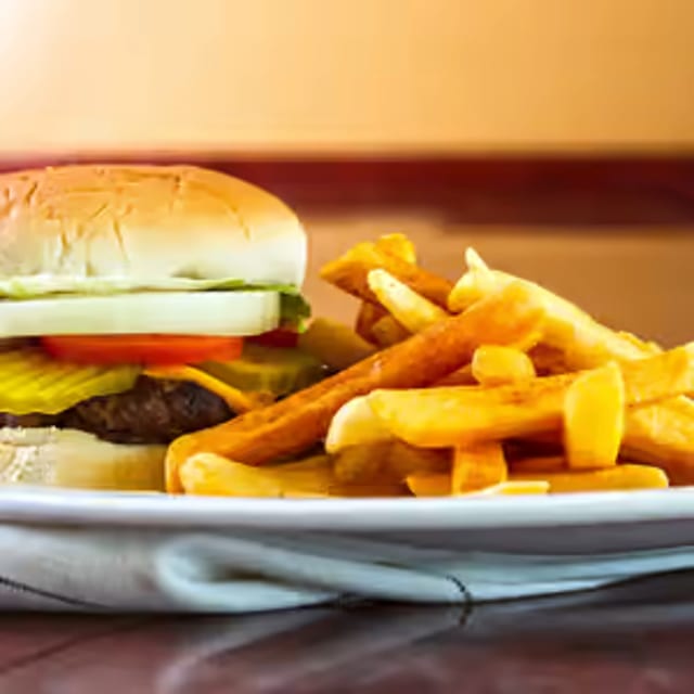 Cheese Burger with fries.