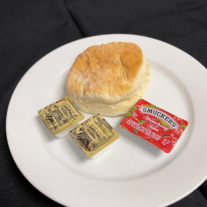 Buttermilk biscuit with butter and jelly.