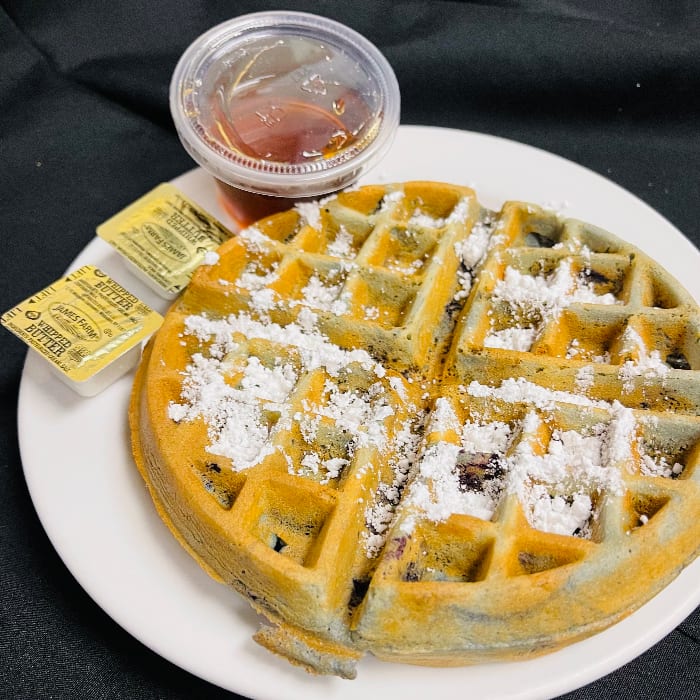 Blueberries Waffle with Powdered Sugar.