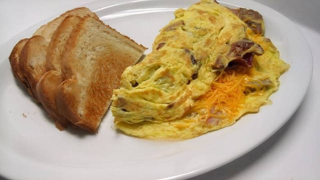 Meat lover & cheese with toast.